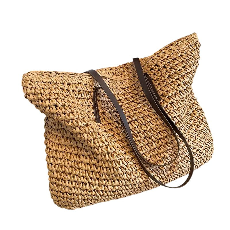 Borsa tote intrecciata Adele color caffè, dettaglio delle cuciture e del manico per mostrare la qualità.