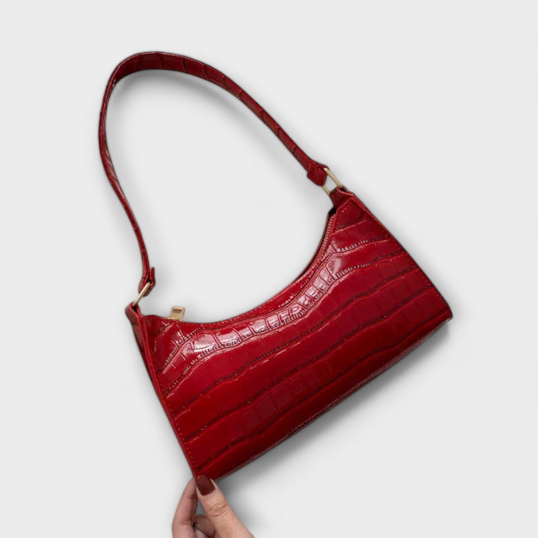 Interno della borsa Bianca nera, che mostra gli scomparti e lo spazio per organizzare gli oggetti personali.