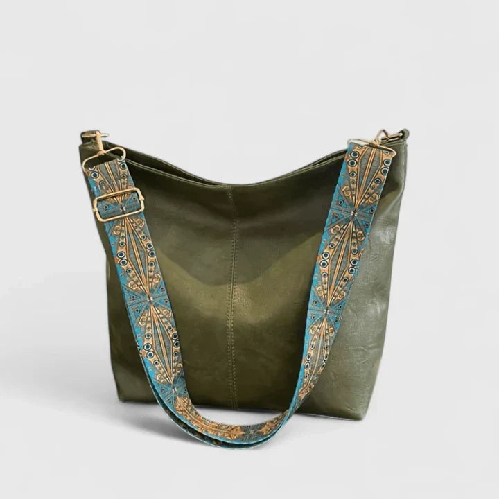 Interno spazioso della borsa Bianca verde, con diversi scomparti per organizzare gli oggetti personali.