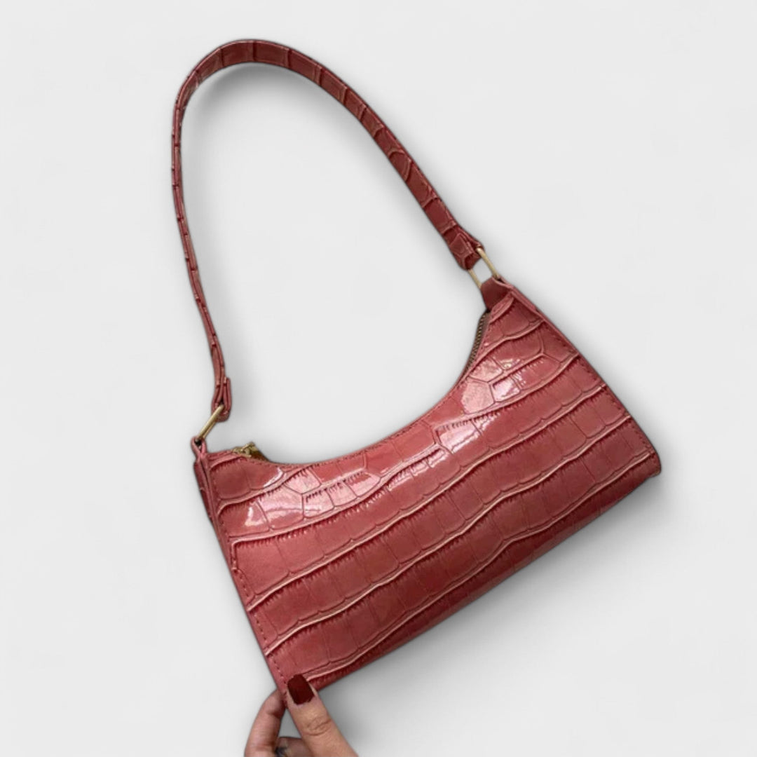 Borsa Bianca bianca, su sfondo neutro, mettendo in risalto la sua purezza e versatilità estiva.