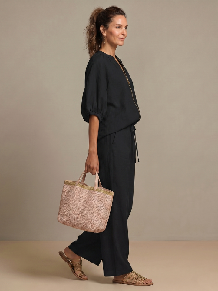 Pantaloni a gamba larga Cleo blu, dettaglio della cucitura laterale.