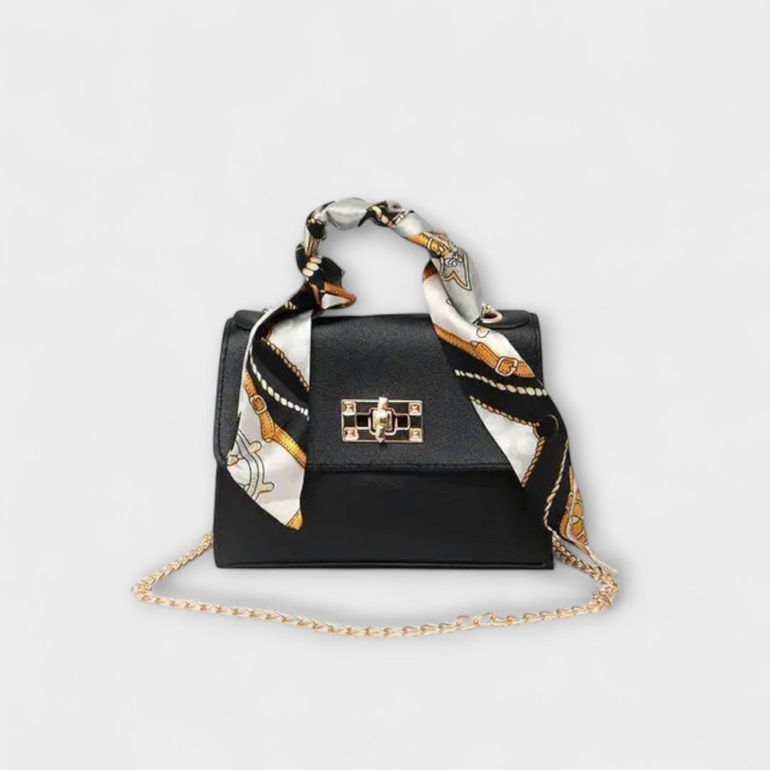 Borsa a spalla Eleonora in marrone chiaro con sciarpa decorativa su sfondo neutro, vista frontale.
