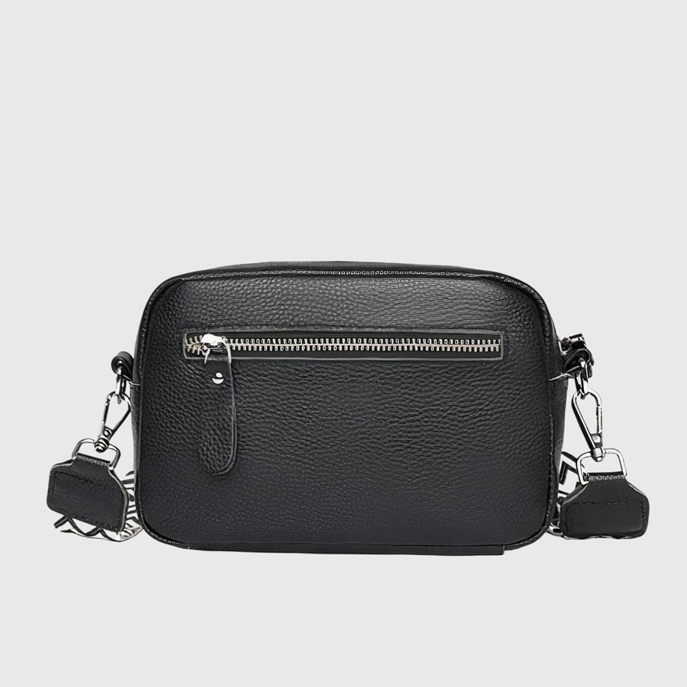 Borsa a tracolla Ella in pelle beige, angolazione laterale, mostrando la profondità e la struttura della borsa.