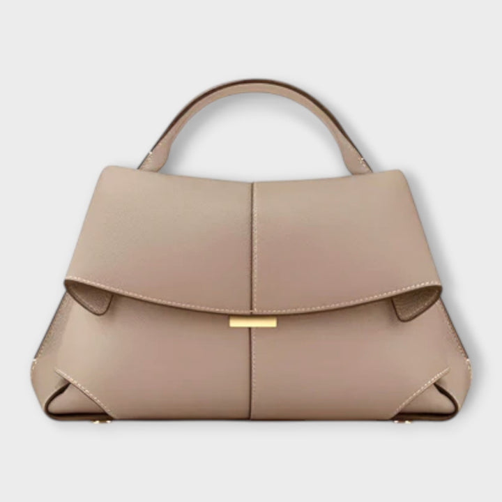 Borsa a tracolla di lusso color bianco, angolazione laterale che evidenzia la forma strutturata e la qualità dei materiali.