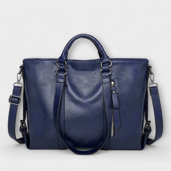 Achterkant van de Fiona elegante leren handtas, wat de strakke afwerking en het gestroomlijnde ontwerp toont.