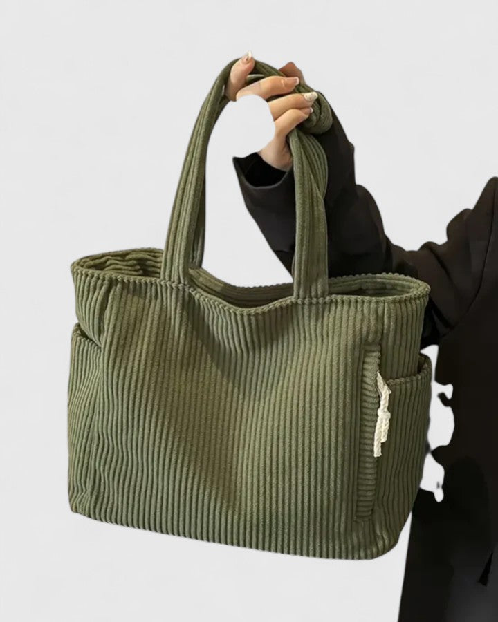 Borsa tote sofisticata Isabel color verde, vista frontale su sfondo neutro, con dettagli del look a corda.