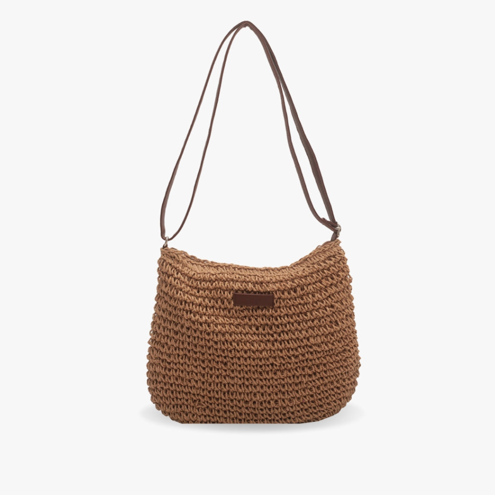 Dettaglio della tracolla regolabile della borsa Isadora, evidenziando il comfort e la praticità.