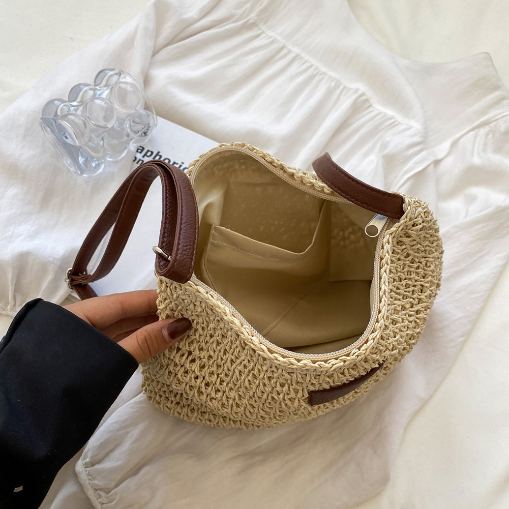 Primo piano della chiusura della borsa a spalla Isadora, con dettagli della finitura di alta qualità.