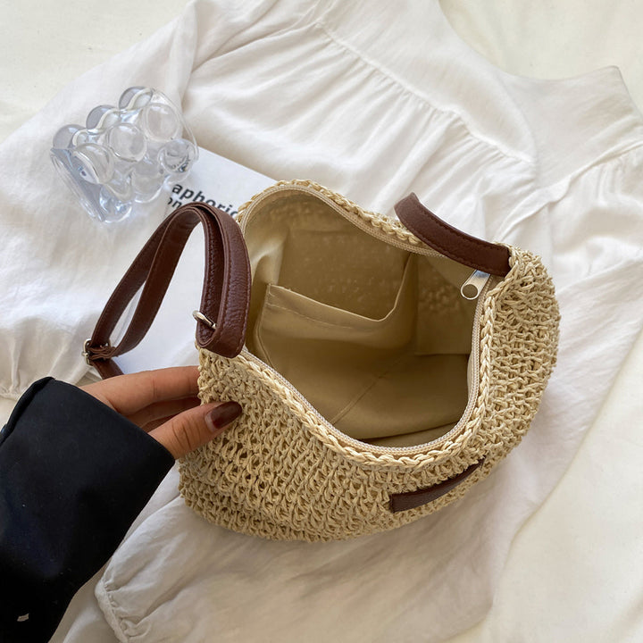 Primo piano della chiusura della borsa a spalla Isadora, con dettagli della finitura di alta qualità.