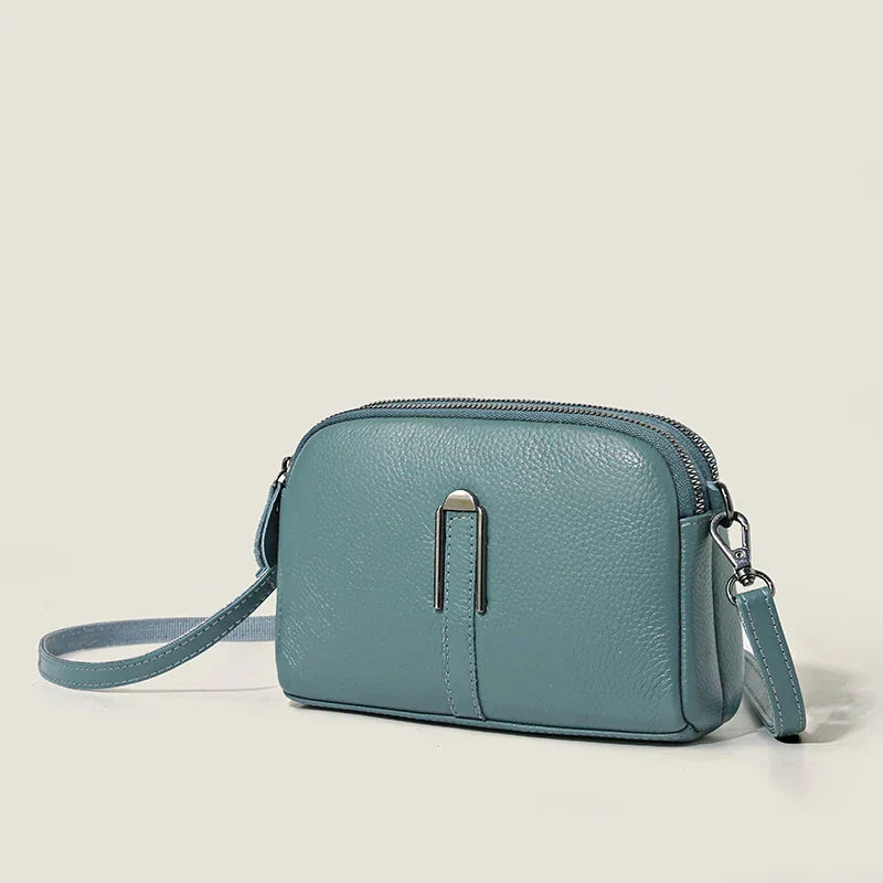 Borsa a tracolla Juliette di lusso color marrone, vista frontale su sfondo neutro, che mostra il design elegante.