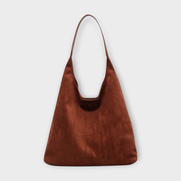Borsa a mano Margherita di colore nero, vista laterale, che mostra la silhouette raffinata e la qualità dei materiali.