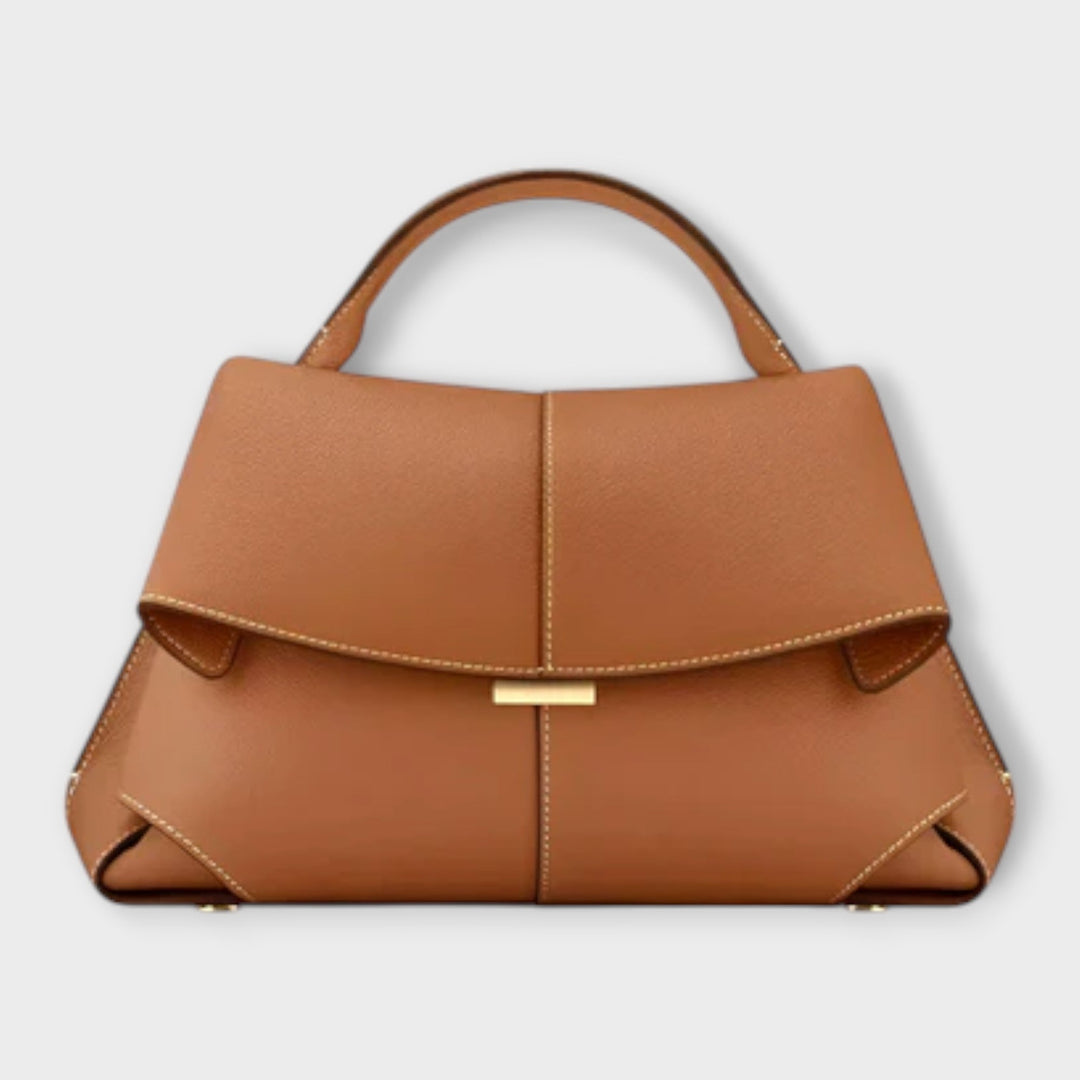 Borsa Ophelia color bordeaux in pelle, vista dall'alto con gli scomparti interni aperti.