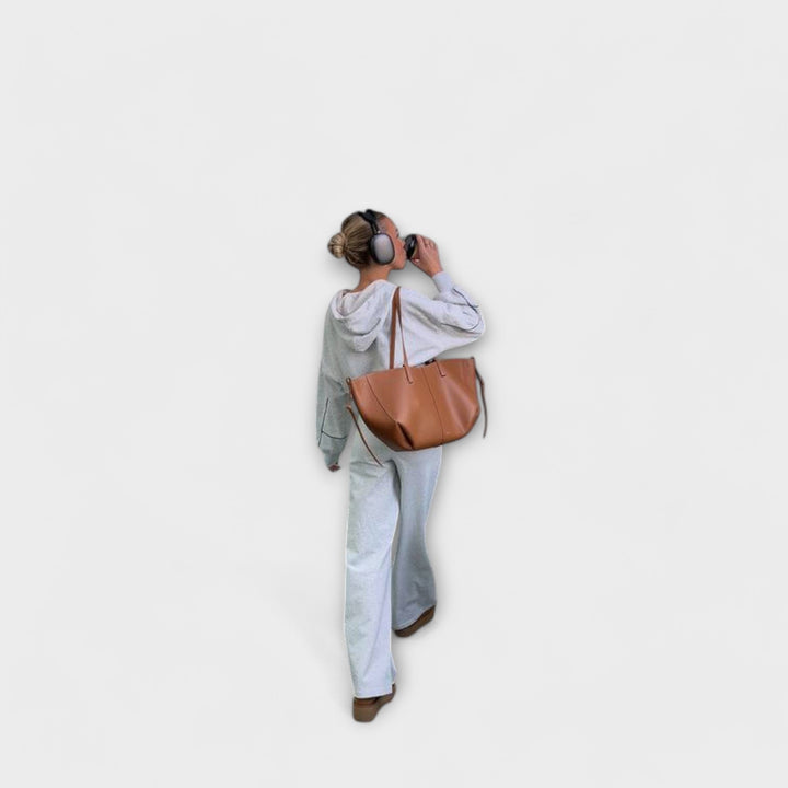 Chiusura sicura della borsa tote vintage Sophie, con dettagli in metallo lucido.
