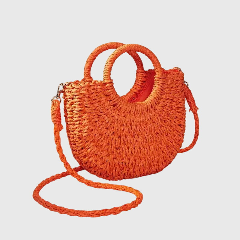 Dettaglio della texture traforata della borsa a spalla Soraya, evidenziando la lavorazione artigianale.
