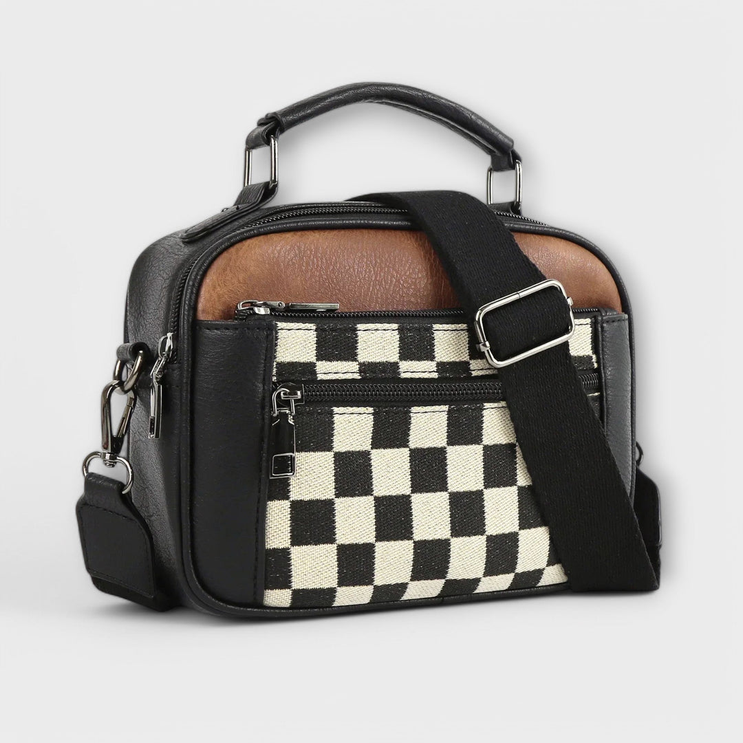 Borsa a spalla Talia nera, vista frontale, con tracolla regolabile e dettagli metallici discreti.